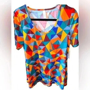 Lularoe small multicolor geometric Perfect T. NWT. Bright and colorful swing top